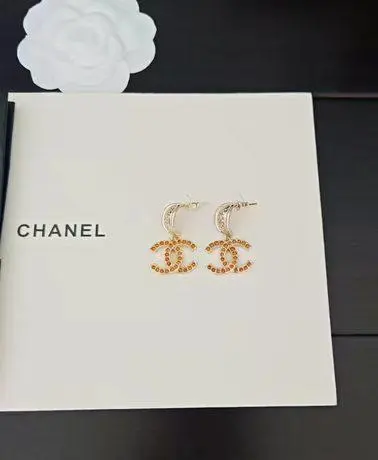 CHANEL ココマーク オレンジラインストーン ペンダントイヤリング