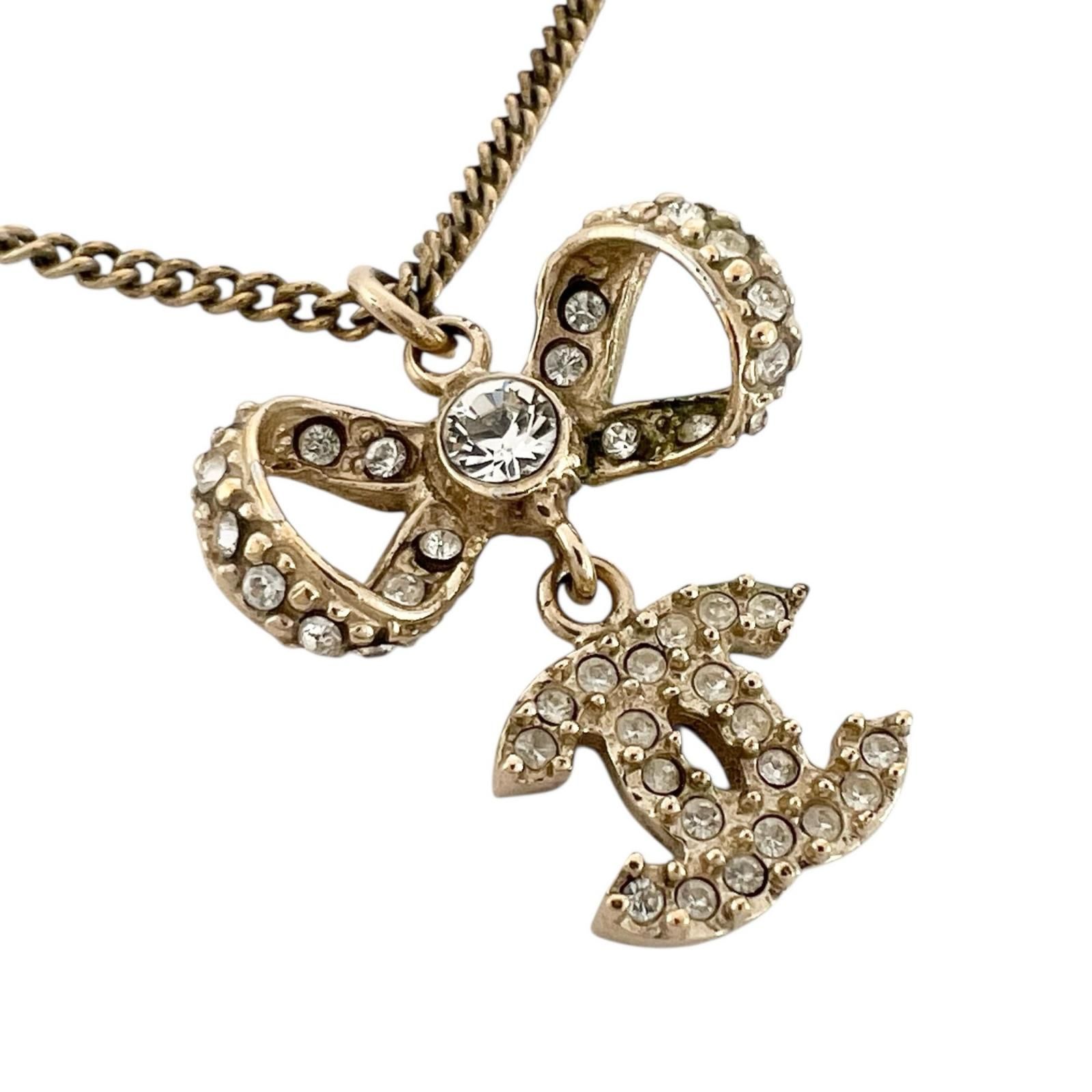 CHANEL シャネル リボンモチーフ ココマーク ネックレス クリスタル/メッキ ゴールド【中古】 レディース